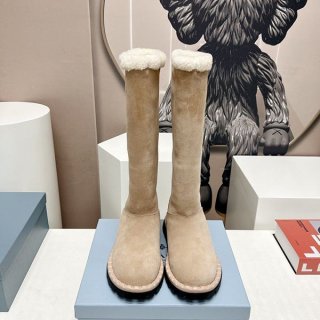 Prada triangle logo suede boots puu19529