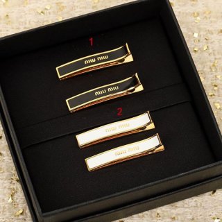 Miu Miu enamel metal fake hair clip myv91032