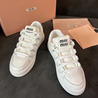 Love at first sight? Miu Miu sneakers replica painted logo canvas myy97879